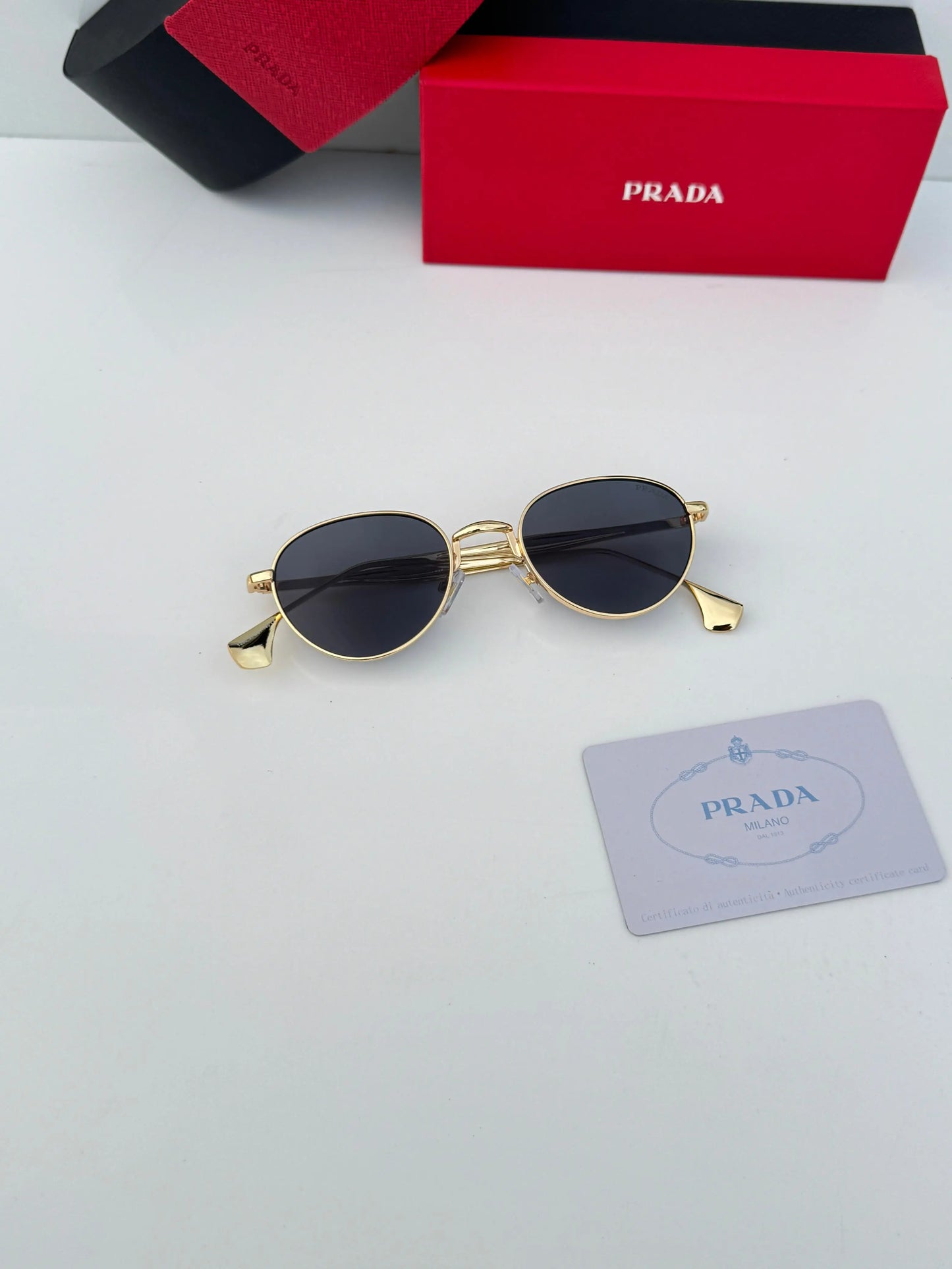 Prada_1396_gold_black