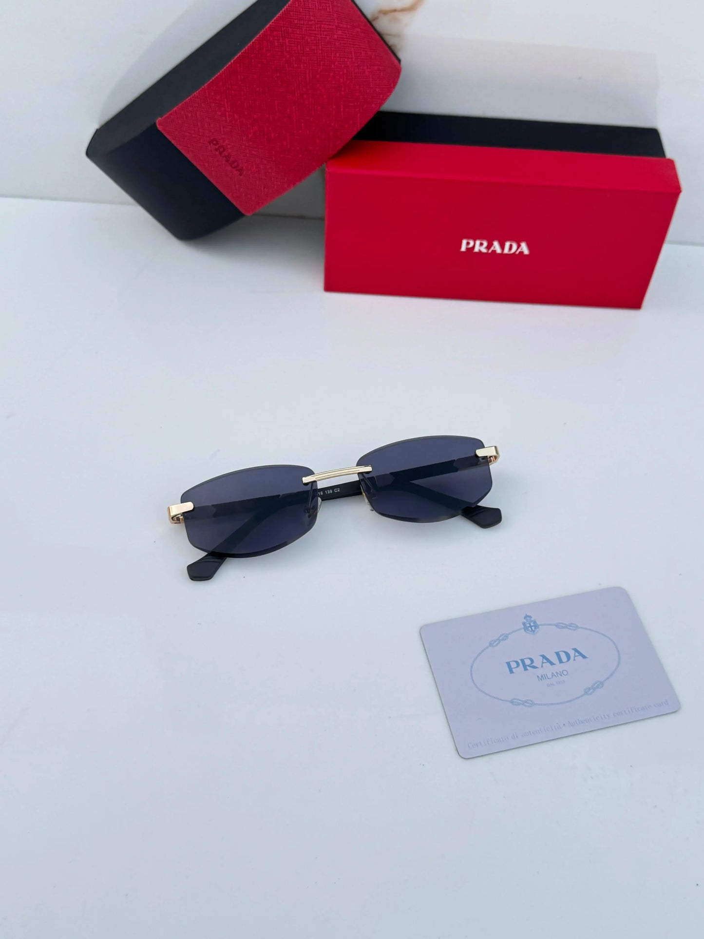 Prada_124_gold_black