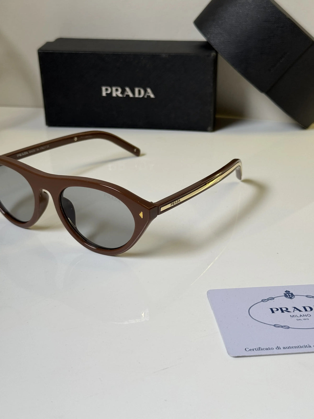 Prada_15S_Gold_Brown
