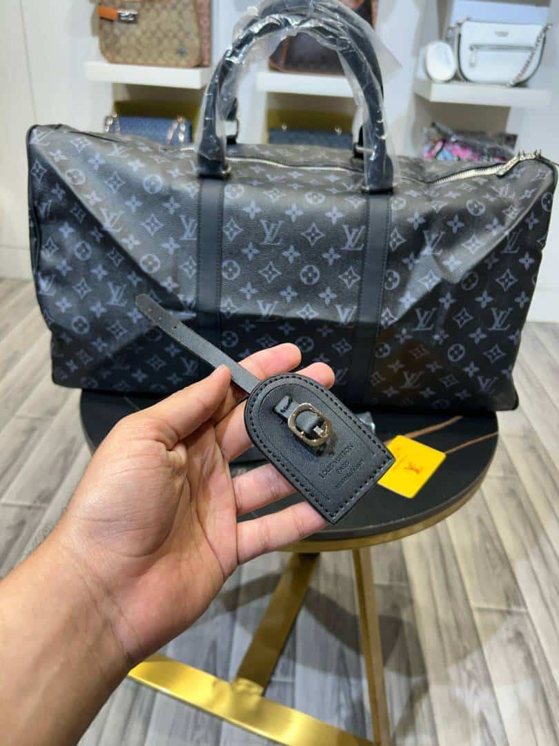 Louis_Vuitton_duffle_bag_with_lock_&_key_970