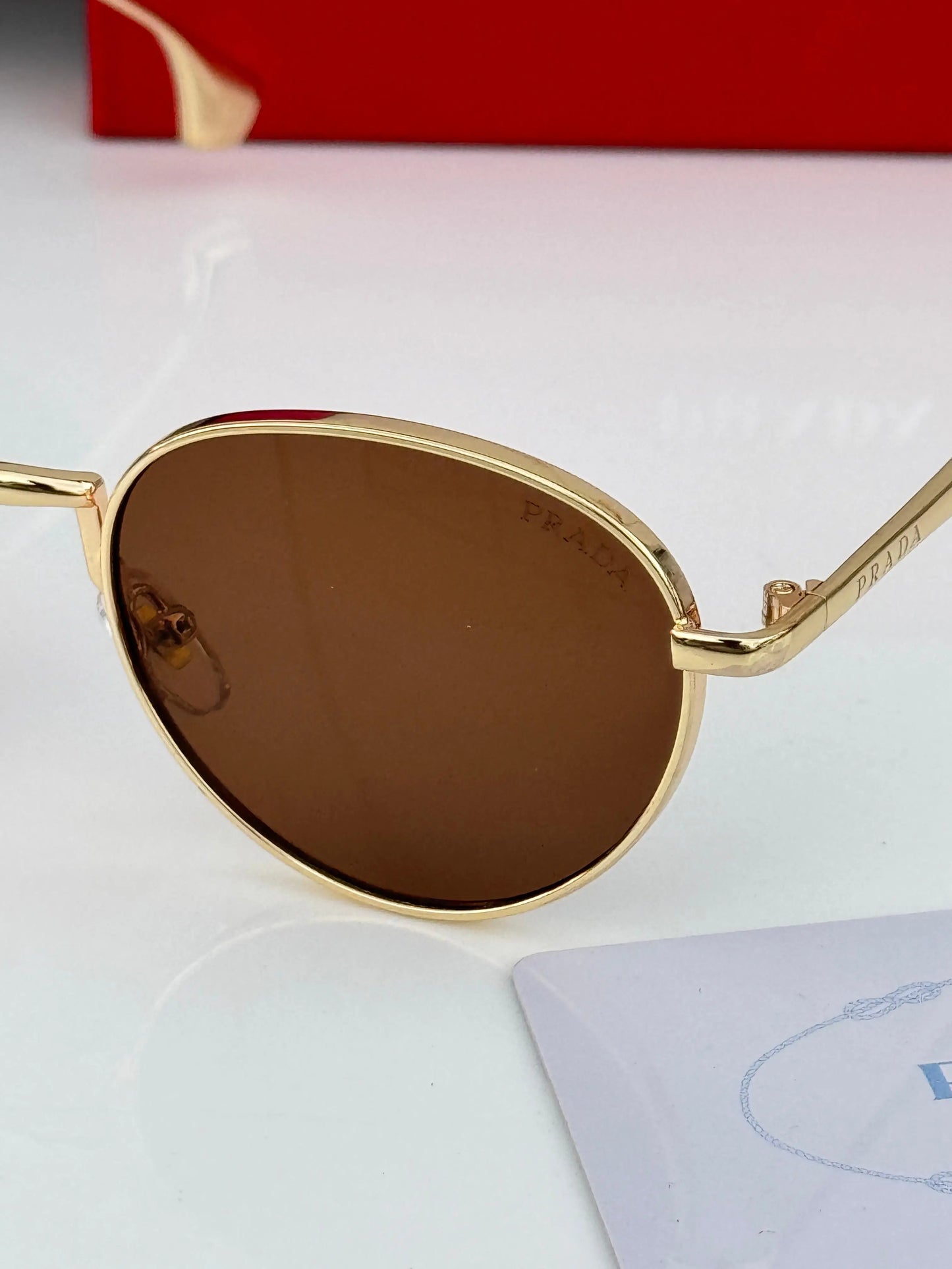 Prada_1396_gold_brown